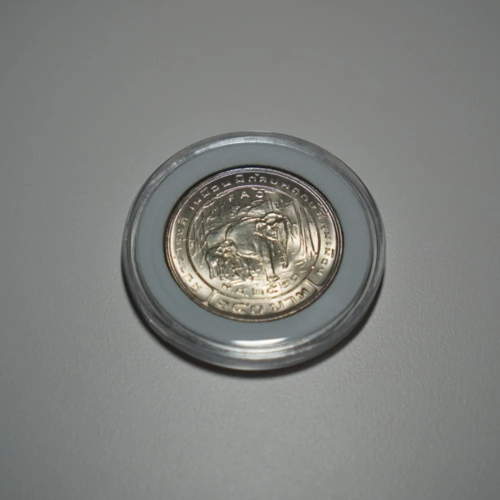 เหรียญ 150 บาท เหรียญกษาปณ์ที่ระลึกรัชกาลที่ 9 องค์การอาหารและการเกษตรแห่งสหประชาชาติ — รูปที่ 2