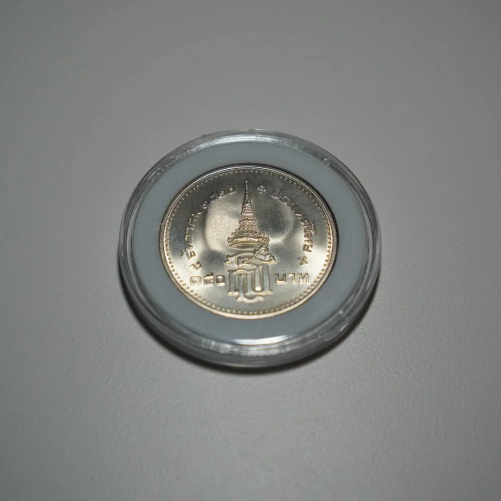 เหรียญ 150 บาท เหรียญกษาปณ์ที่ระลึกรัชกาลที่ 9 พระราชพิธีสถาปนาสมเด็จพระเทพรัตนราชสุดาฯ สยามบรมราชกุมารี — รูปที่ 2